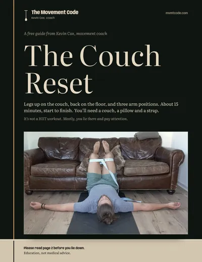 The cover of The Couch Reset: Kevin lying on a mat with his calves on a pillow on a leather couch, a strap around his thighs and his arms out to the sides.